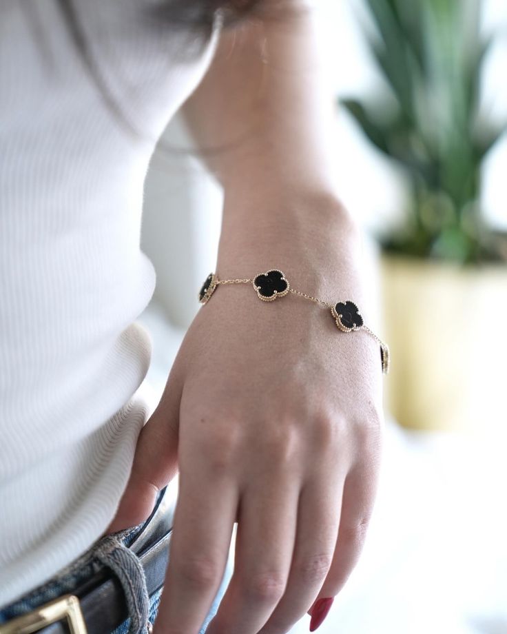 Elegant Black Reversible Clover Bracelet Gifted by Moni
