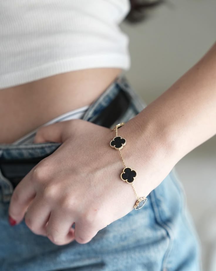Elegant Black Reversible Clover Bracelet Gifted by Moni
