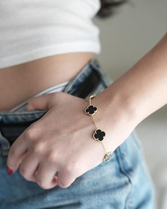 Elegant Black Reversible Clover Bracelet Gifted by Moni