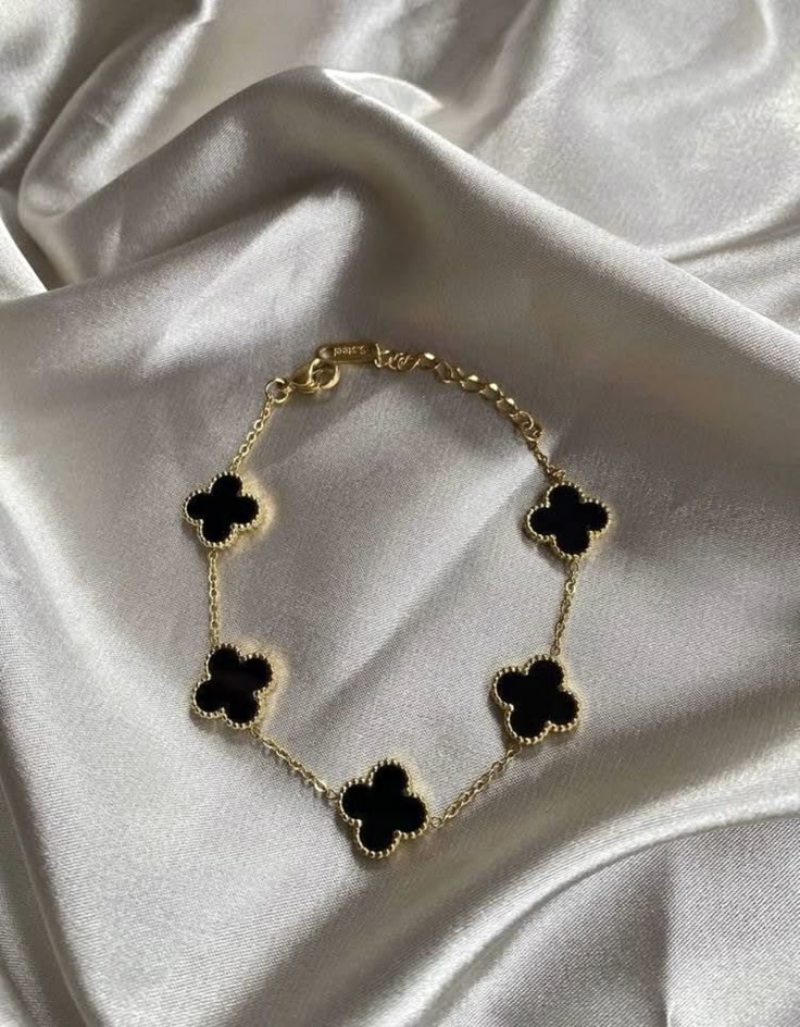 Elegant Black Reversible Clover Bracelet Gifted by Moni