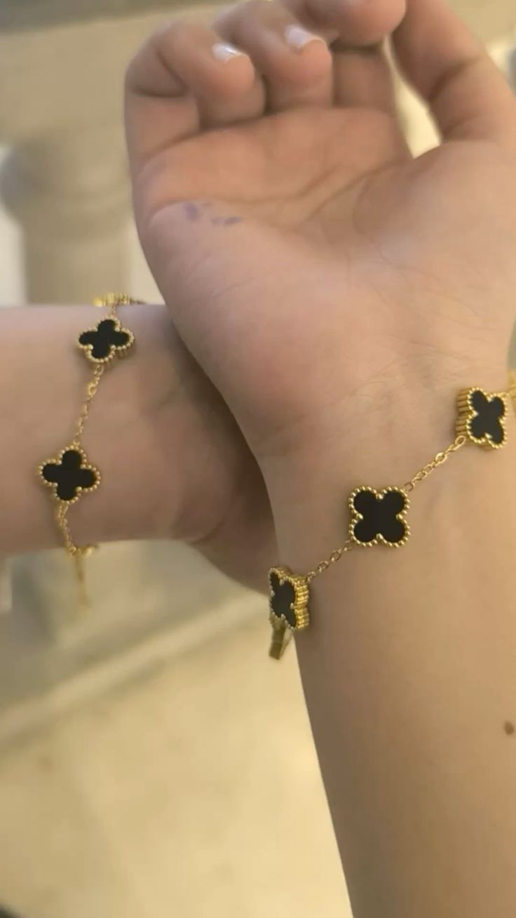Elegant Black Reversible Clover Bracelet Gifted by Moni