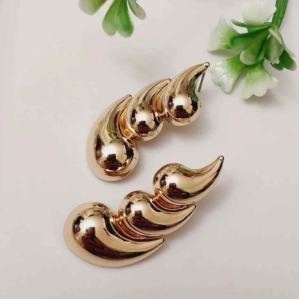 Chunky Gold Sculptural Swirl Stud Earrings Gifted by Moni